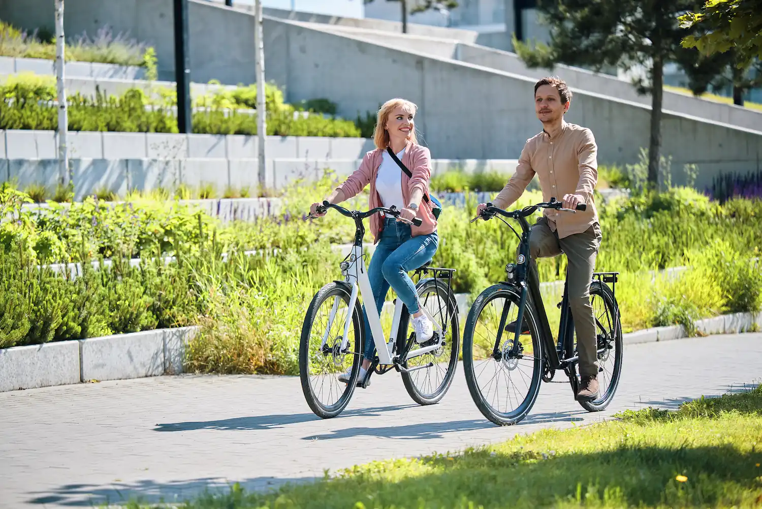 woman and men riding e-bike